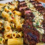 Cheesy Cajun Garlic Butter Steak with Creamy Rigatoni