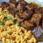 Garlic Butter Steak Bites with Spicy Cajun Alfredo Twisted Pasta