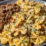 Cheesy Bowtie Pasta with Savory Cajun Ground Beef in Garlic Cream 1