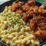 Garlic Butter Chicken Bites & Cajun Alfredo Mac with Crispy Onion Topping